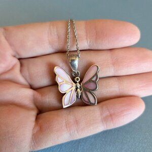 Sterling silver cloisonne enameled butterfly pendant on silver chain.